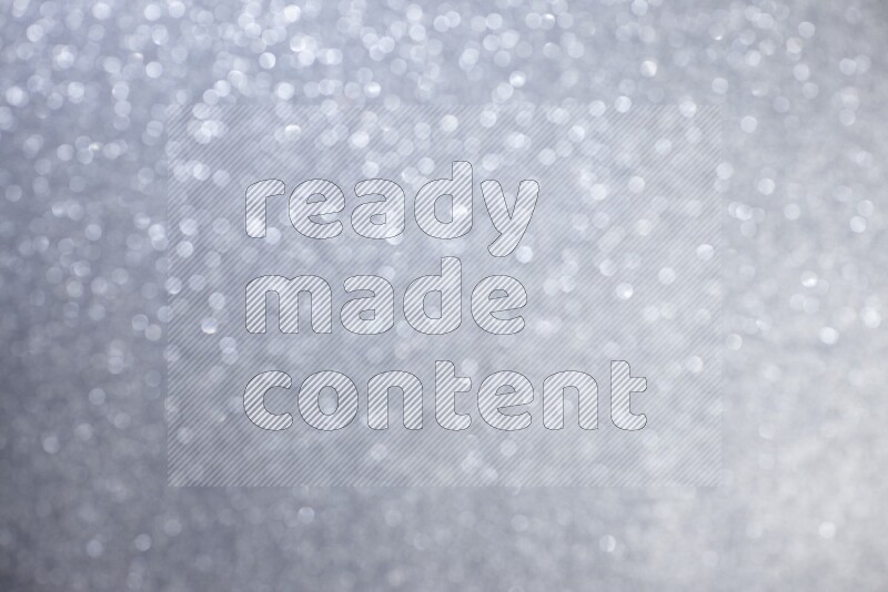 Silver glittery bokeh background