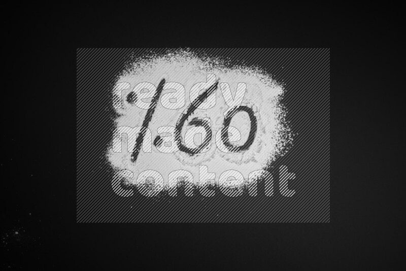 Percentages written with powder on black background