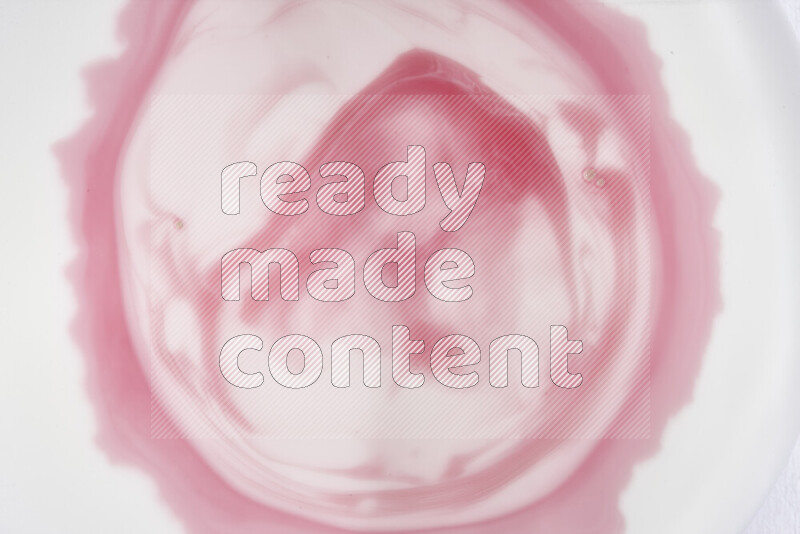 لقطة مقربة لأنماط دوامية باللون الأحمر والأبيض