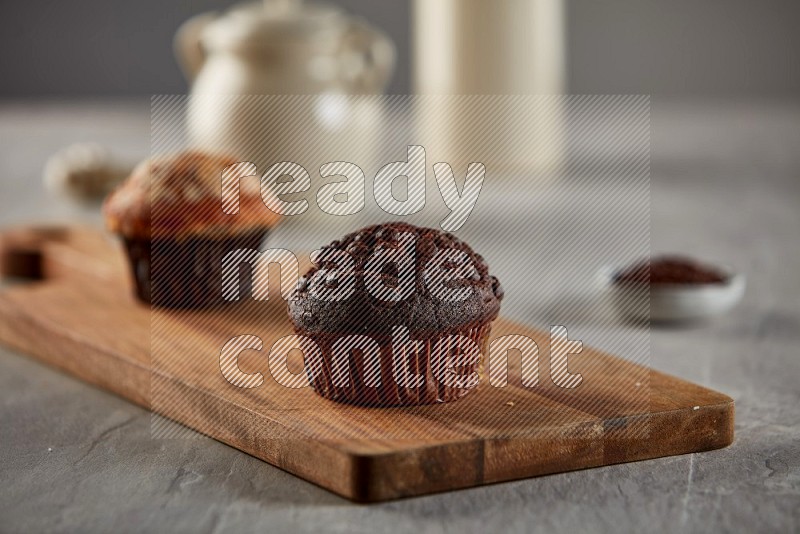 Chocolate cupcake on a wooden board
