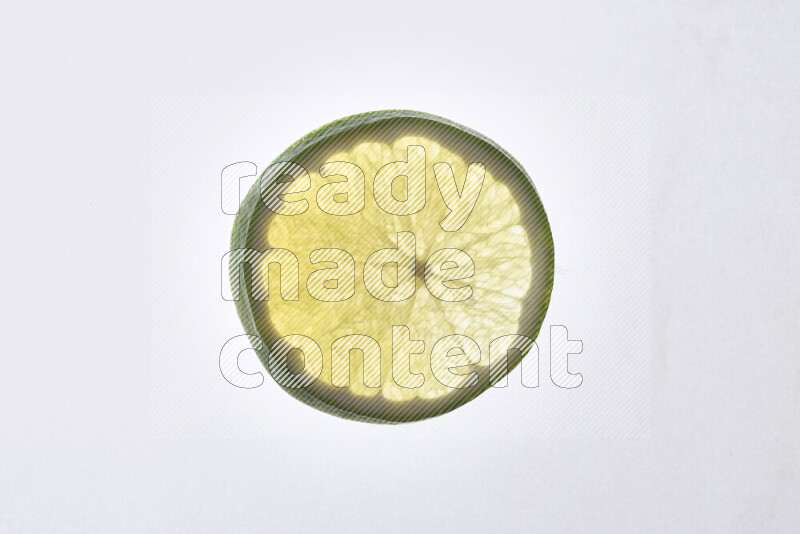 Orange slices on illuminated white background