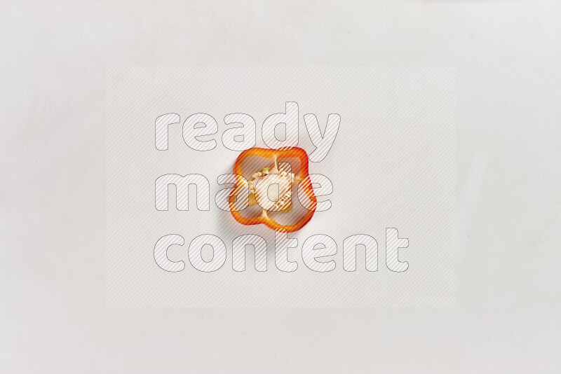 Red bell pepper slices on white background