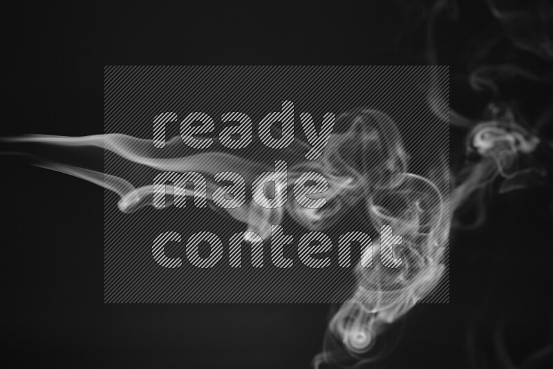 Motion of wavy smoke isolated on dark background