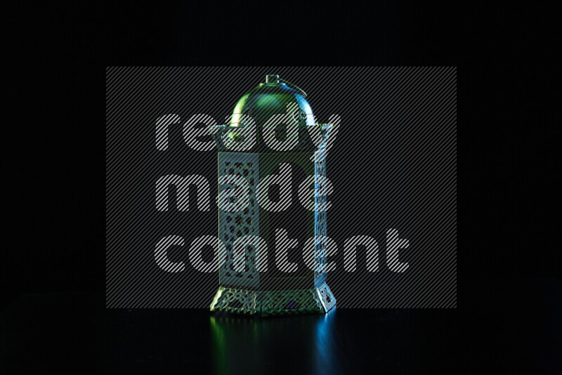 Ramadan lanterns with colored rim light against black background