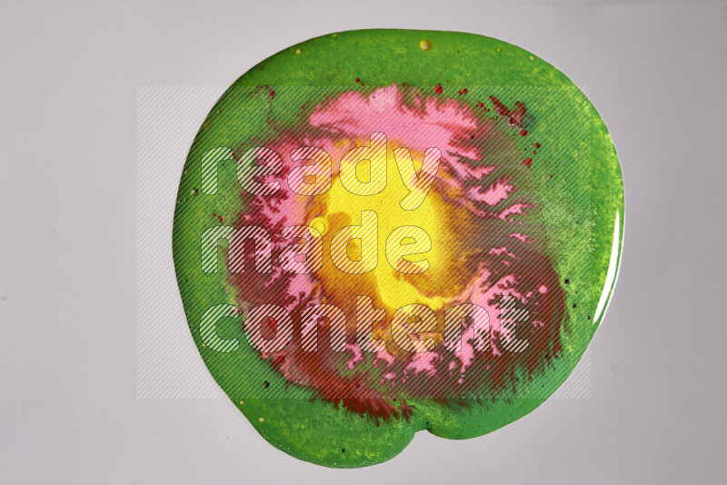 Close-ups of assorted colors blending on a grey background