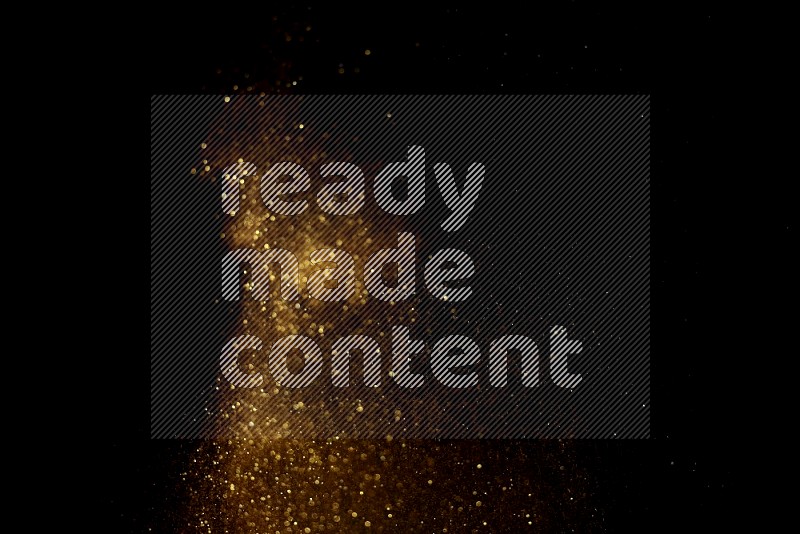 Gold glitter powder isolated on black background