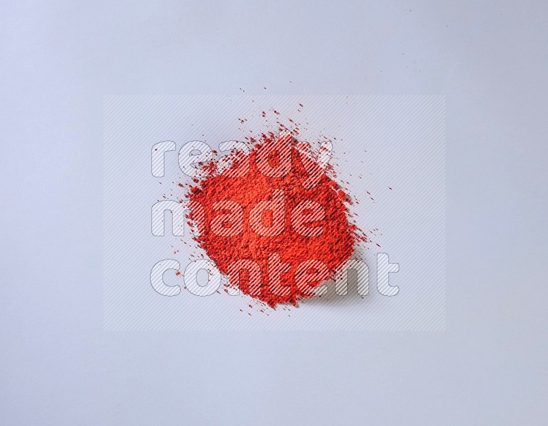 Red powder on white background