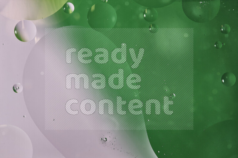 Close-ups of abstract oil bubbles on water surface in shades of white and green
