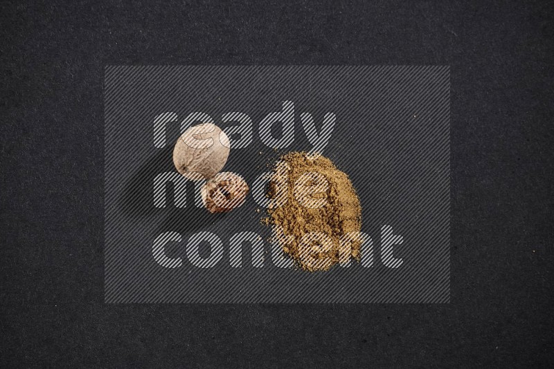 Nutmeg seeds with nutmeg powder beside it on a black flooring in different angles