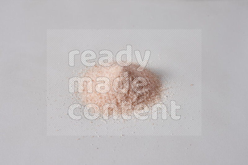 A bunch of fine himalayan salt on white background