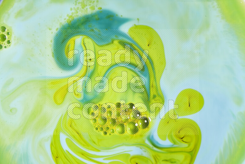 A close-up of abstract swirling patterns in green gradients