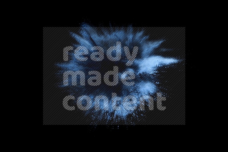 Blue powder explosion on black background