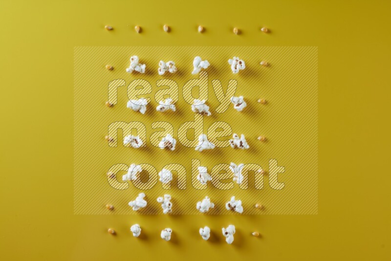 Popcorn flakes and seeds on a yellow background in different angles