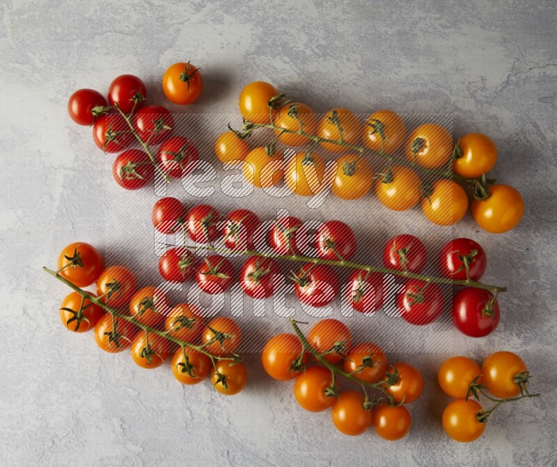 Mixed colors of cherry tomato veins topview on textured vinyl backgrounds