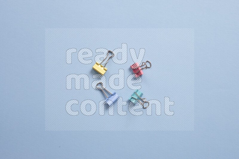 Different school supplies on blue background