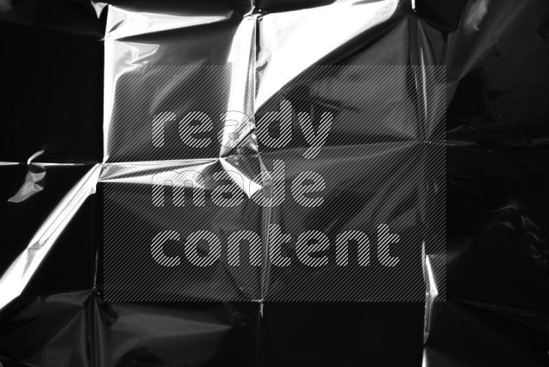 Plastic wrap texture on black background