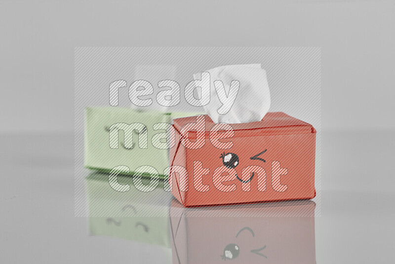 Origami tissue box on grey background