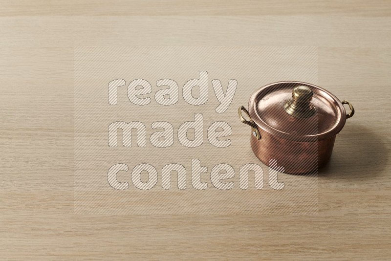 Small Copper Pot on Oak Wooden Flooring, 45 degrees