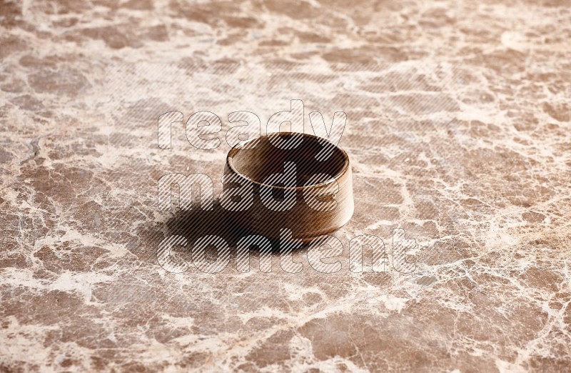 Brown Pottery Bowl on Beige Marble Flooring, 45 degrees