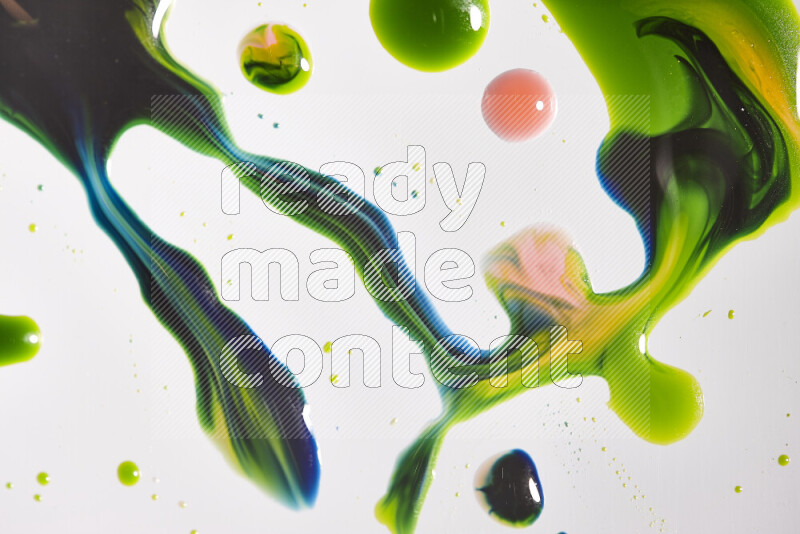 Abstract colorful background with mixed of green, red, blue and yellow paint colors