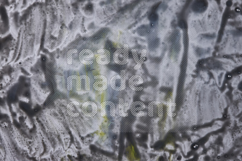 خلفية ملونة مع مزيج من ألوان الطلاء الأزرق والأسود والأصفر