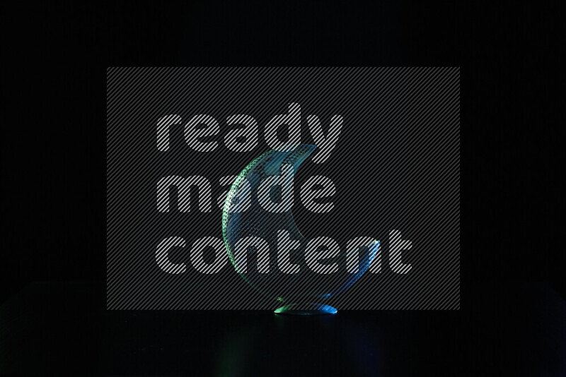 Ramadan lanterns with colored rim light against black background