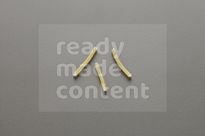 Vermicelli pasta on grey background