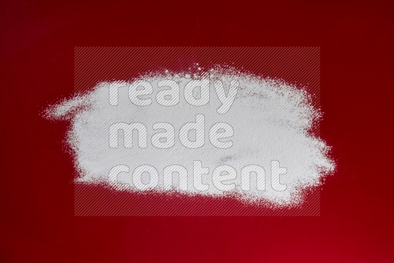 Powder on red background