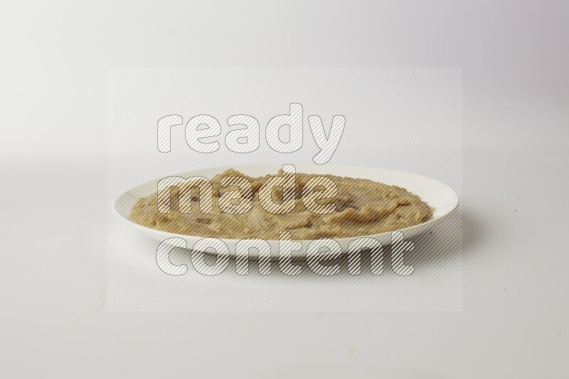 fava bean in a white plate direct on a white background