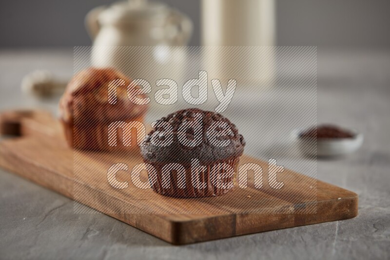 Chocolate cupcake on a wooden board