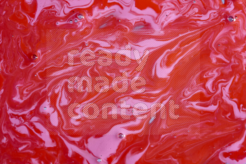 خلفية ملونة مع مزيج من ألوان الطلاء الوردي والأحمر