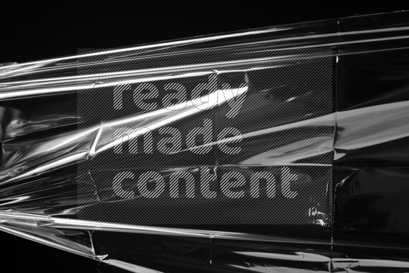 Plastic wrap texture on black background