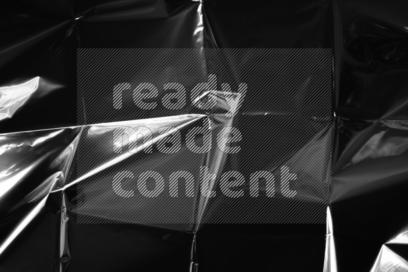 Plastic wrap texture on black background