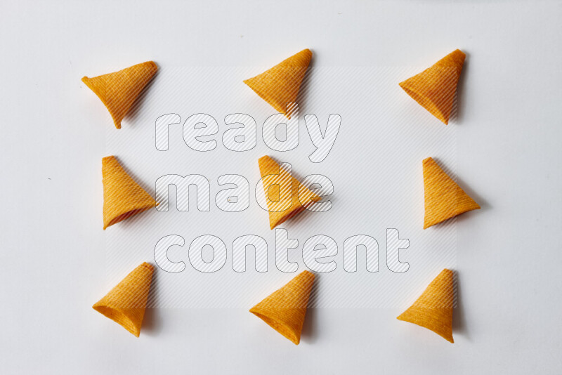 Assorted snacks on white background
