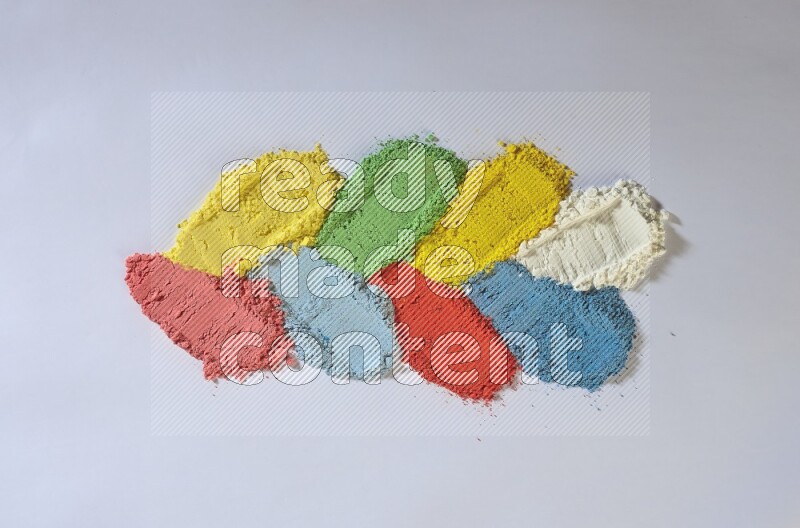 Multicolored powder strokes on white background