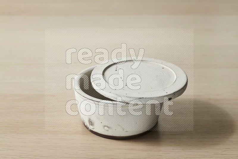 White Pottery Bowl on Oak Wooden Flooring, 15 degrees