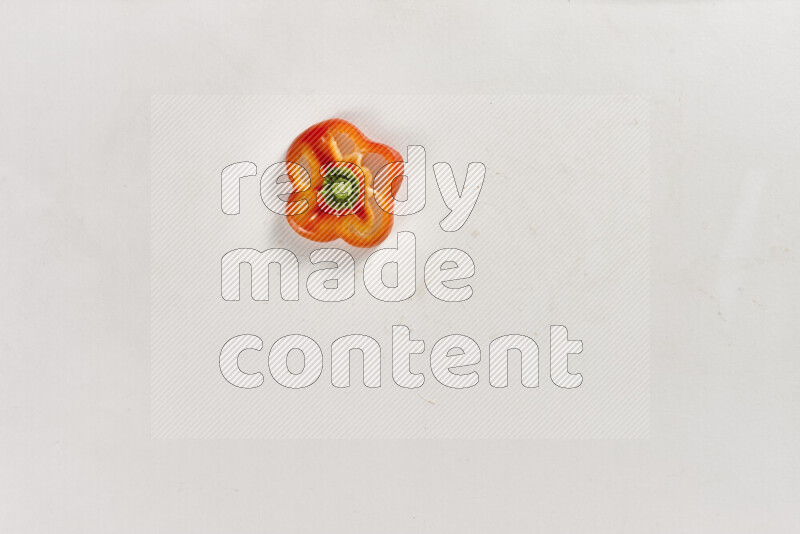 Red bell pepper slices on white background