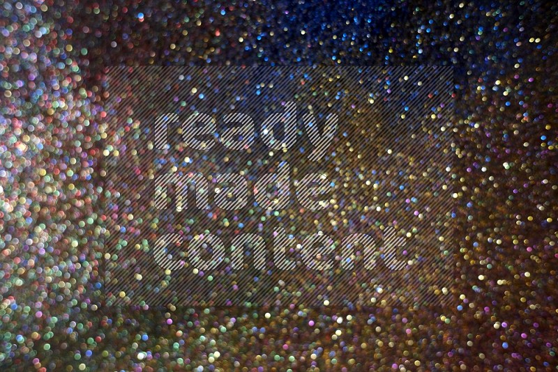 Multicolored glitter powder isolated on black background