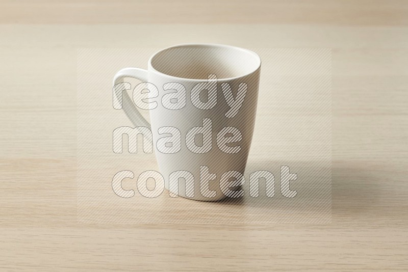 White Ceramic Mug on Oak Wooden Flooring, 15 degrees