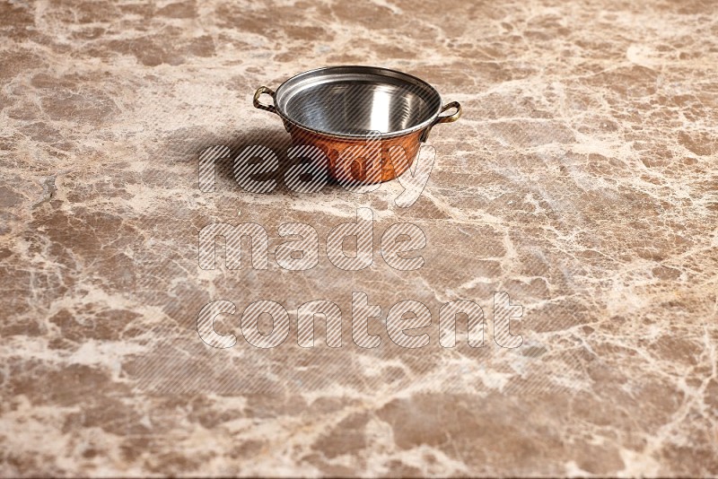 Small Copper Pot on Beige Marble Flooring, 45 degrees