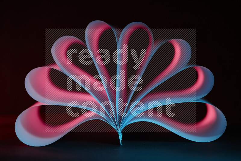 An abstract art piece displaying smooth curves in blue and red gradients created by colored light