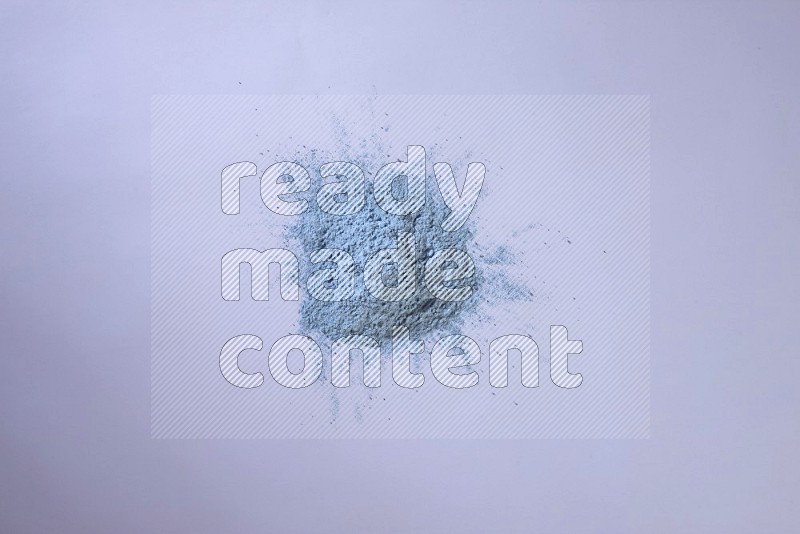 Blue powder on white background