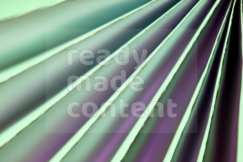 صورة تقدم نمط تجريدي ورقي من الخطوط المائلة بدرجات اللون الأخضر والوردي