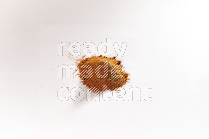 A bunch of ground paprika powder on white background