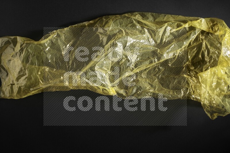 Colored plastic textures on black background