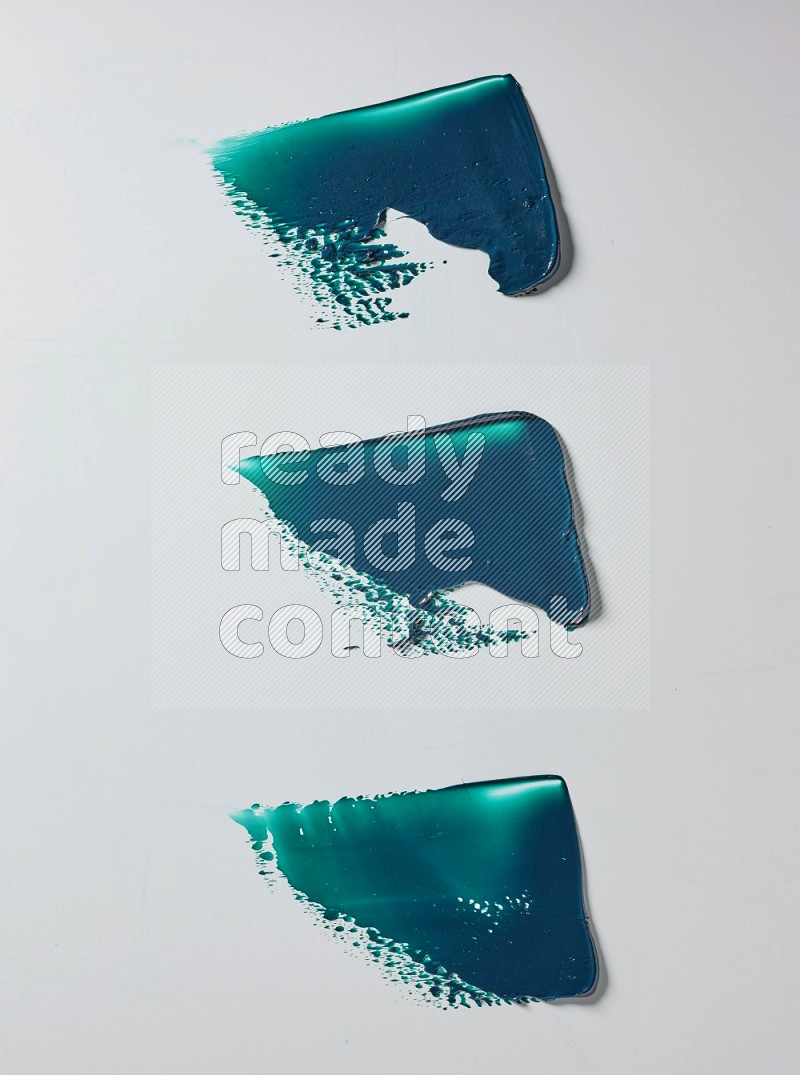 Turquoise painting knife strokes in on white background