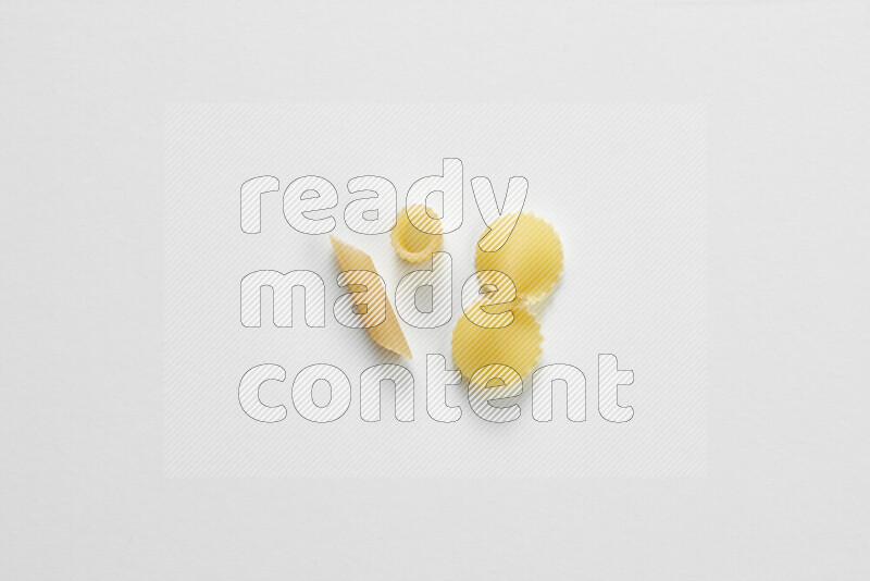 Different pasta types on white background