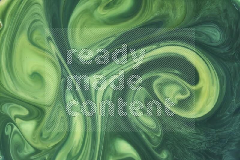 A close-up of abstract swirling patterns in green gradients