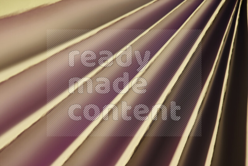 An image presenting an abstract paper pattern of lines in red and gold tones