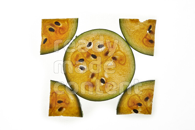 Watermelon slices on illuminated white background